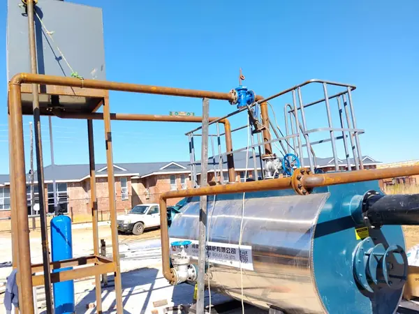 Pipework and access platform around a boiler