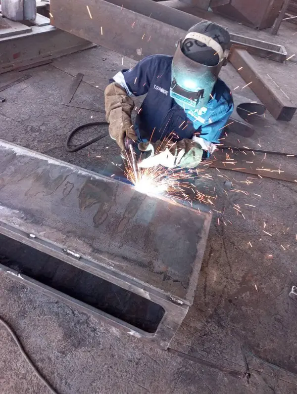 Welder MIG welding a steel fabrication